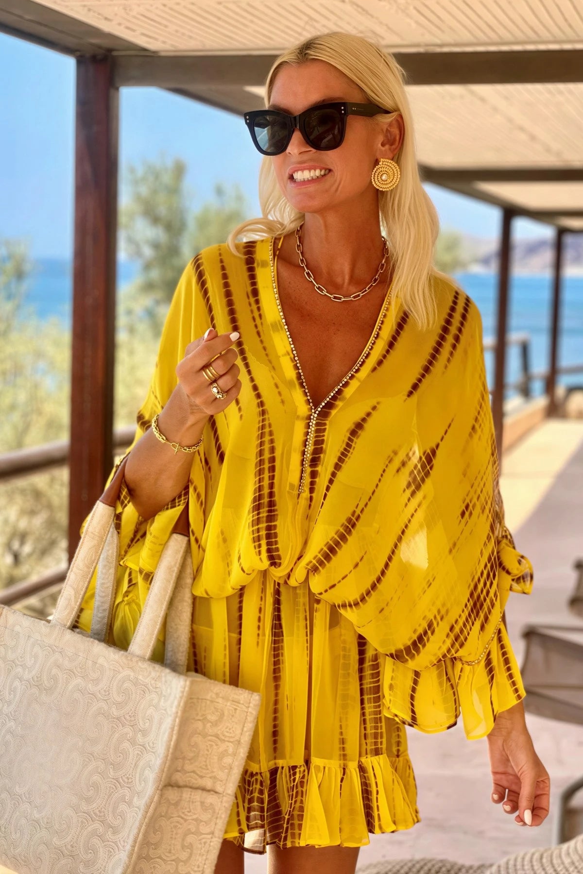 silk bloused luxury designer kaftans to wear on holiday by lindsey brown resort wear 