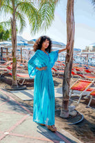 turquoise blue silk luxury maxi kaftan by Lindsey Brown resort wear 