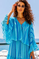 turquoise and blue silk bloused kaftan dress to wear on a luxury holiday by lindsey brown silk resort wear 