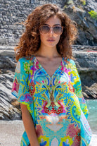 turquoise floaty silk crepe maxi beach cover up for warm holidays by lindsey brown resort wear 