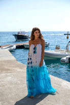 turquoise and white silk maxi dress to wear on warm vacation by lindsey brown luxury resort wear 