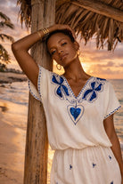 white soft cotton designer v neck beach dress for caribbean holidays by lindsey brown resort wear 