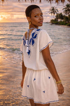white cotton designer v back beach dress for caribbean holidays by lindsey brown resort wear 