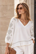 white cotton v  neck blouse with silver embroidery by Lindsey Brown luxury resort wear