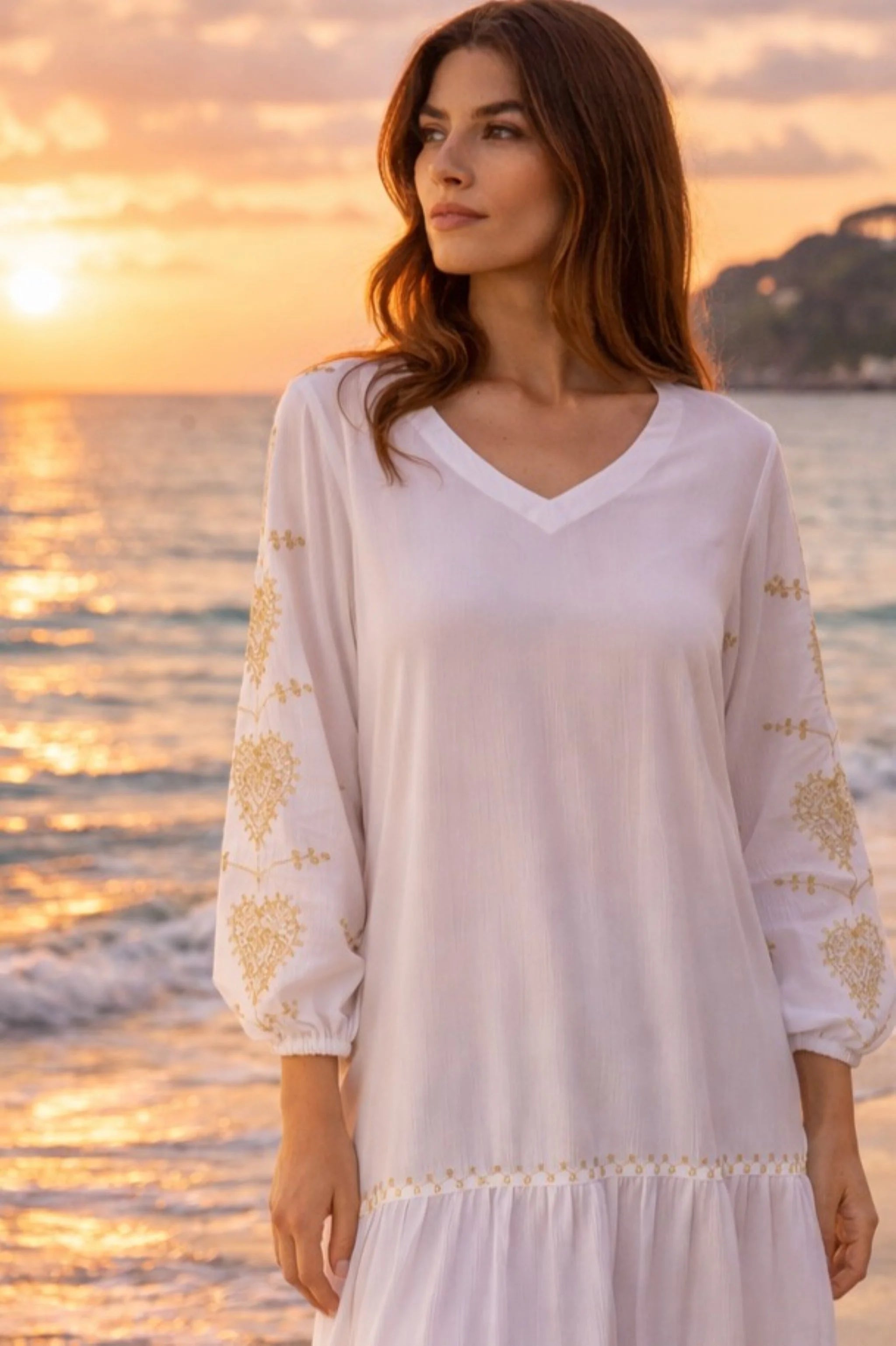 white v neck beach dress with gold sleeve embroidery by lindsey brown