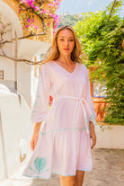white aqua cotton long sleeved beach dresses by Lindsey Brown cotton resort wear