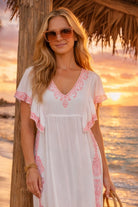 white pink cotton short sleeved midi dress for a caribbean cruise holiday