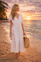 white pink cotton midi length beach dress for a caribbean crise holiday