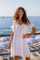 white relaxed fit cotton beach dress for warm holidays by lindsey brown resort wear 