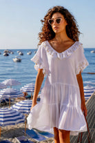 white v neck knee length cotton beach dresses by lindsey brown resort wear 