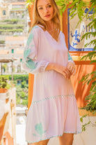 white cotton long sleeved beach dresses by Lindsey Brown cotton resort wear