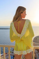 yellow low v back short silk designer kaftan to wear on holiday by Lindsey Brown resort wear 