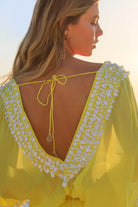 yellow low back short silk designer kaftan to wear on holiday by Lindsey Brown resort wear 