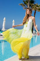yellow and white silk maxi dresses in plus sizes to wear on vacation by lindsey brown resort wear 