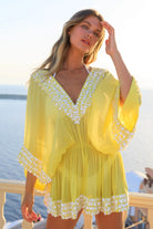 yellow silk short designer kaftan to wear on holiday by Lindsey Brown rluxury resort wear 