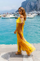 yellow off the shoulder silk maxi dress to wear on vacation by Lindsey Brown resort wear