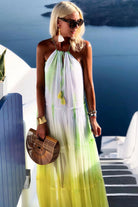 yellow stunning silk  resort wear dress to wear on vacation by lindsey brown resort wear 