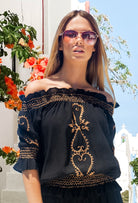 black rose gold off the shoulder holiday tops by Lindsey Brown resort wear, perfect for holidays to wear both day and night