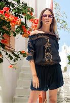 Designer black bardot holiday tops to wear in Majorca on holiday by Lindsey Brown 