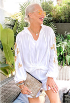 White designer blouse by Lindsey Brown resort wear