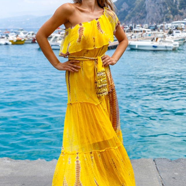 yellow silk designer resort wear dress to wear on a luxury holiday by lindsey brown 